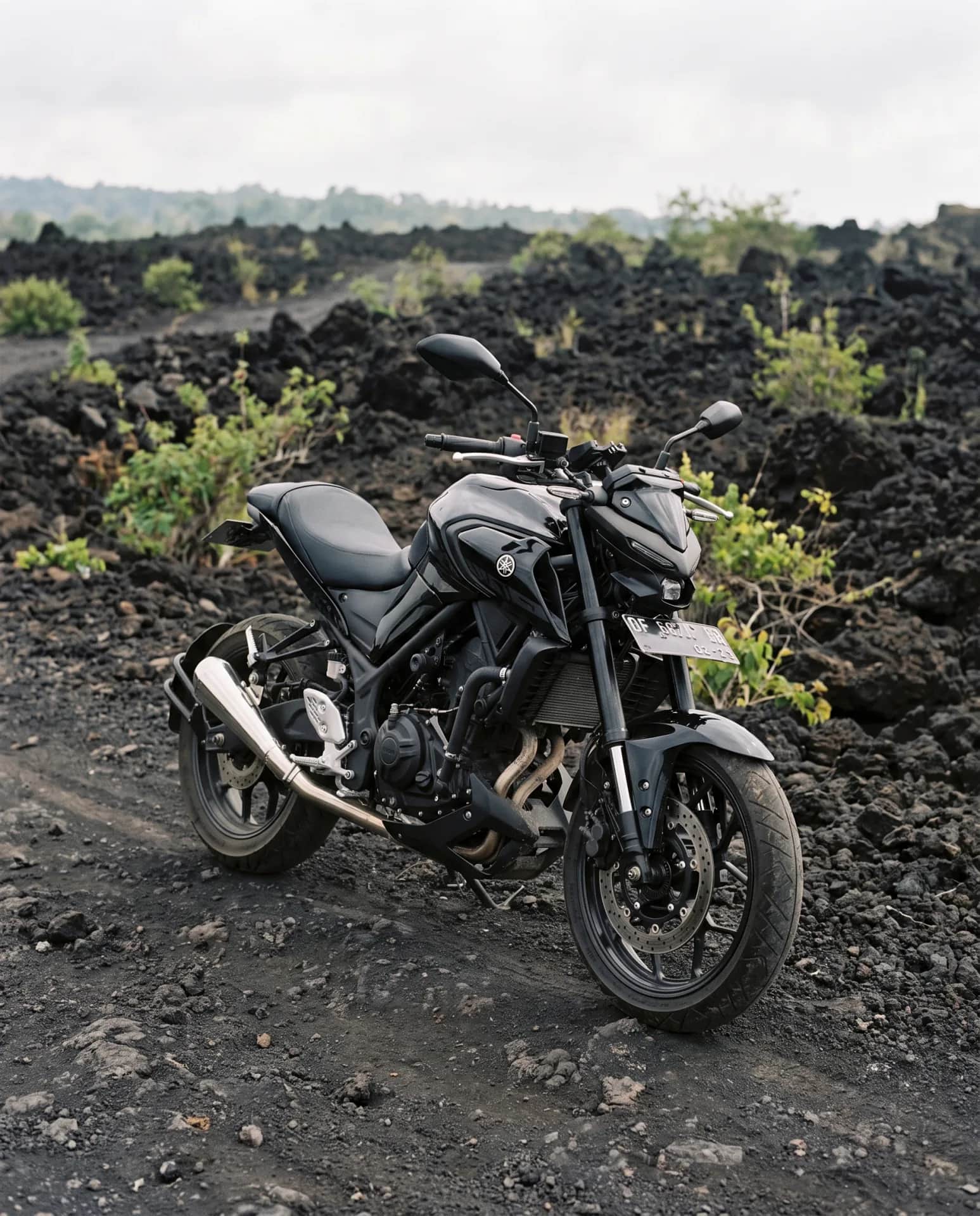 Yamaha MT-25 (2020) on a volcanic lava field near Mount Batur, Bali